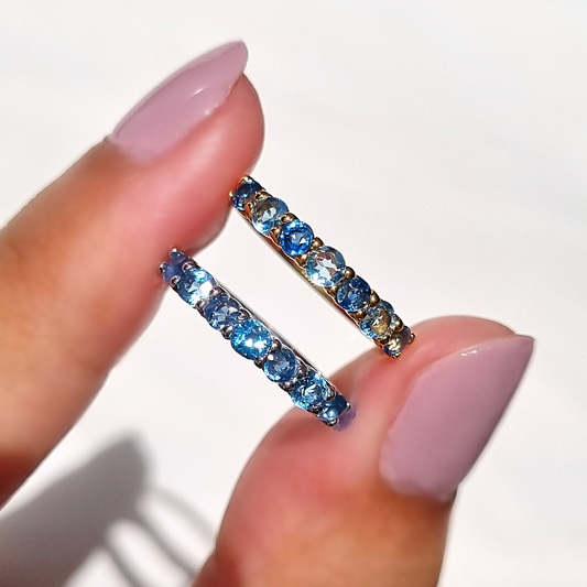 natural blue sapphire and Swiss blue topaz stacking eternity wedding ring in sterling silver and 18k gold vermeil