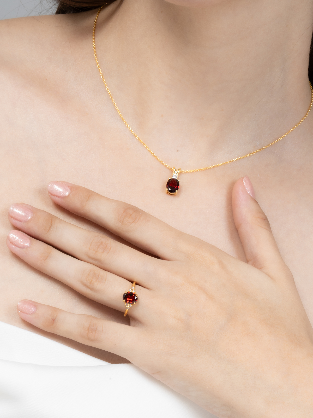 natural oval cut red garnet necklace with diamond pendant and matching ring in 18k gold vermeil