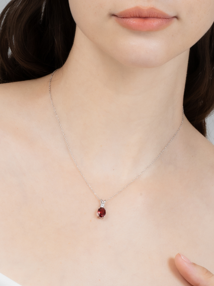 natural oval cut red garnet necklace with diamond pendant in sterling silver