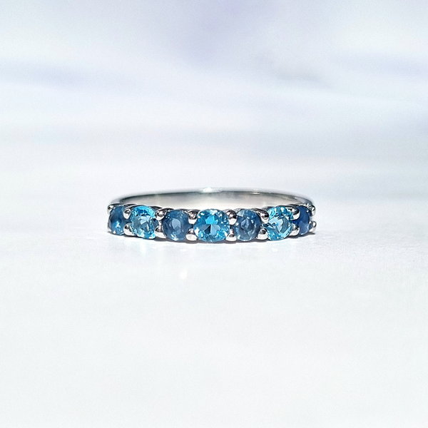 natural blue sapphire and Swiss blue topaz stacking eternity wedding ring in sterling silver