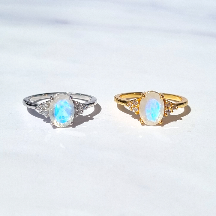 oval cut rainbow moonstone  engagement, promise and wedding ring  in 18k sterling silver.
