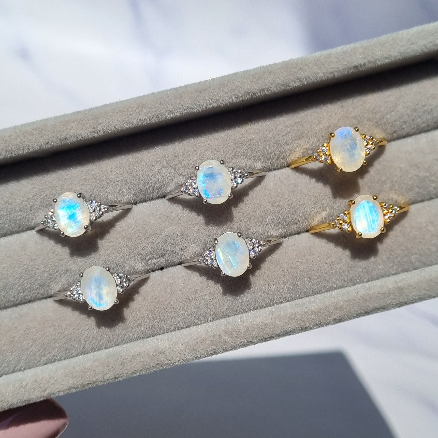 oval cut rainbow moonstone  engagement, promise and wedding ring  in 18k sterling silver.