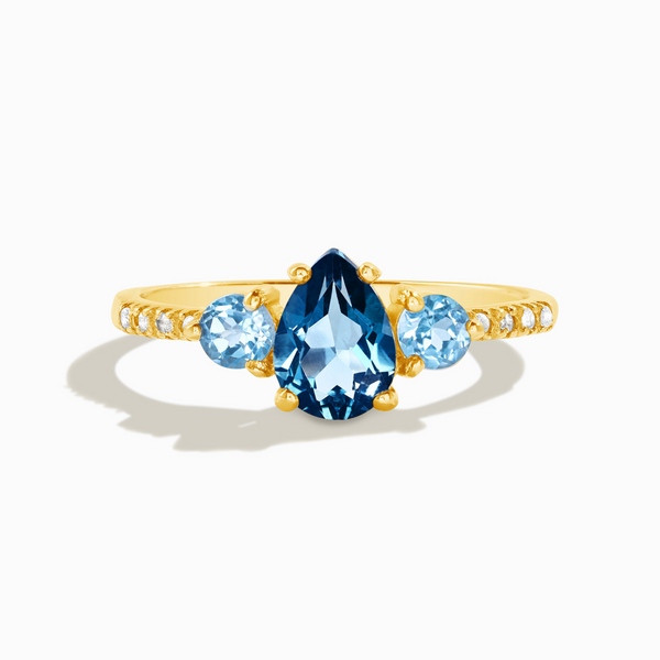 pear cut London blue and round cut Swiss blue topaz engagement and promise ring in 18k gold vermeil