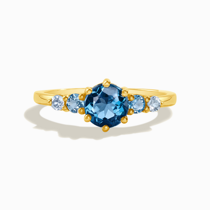 round cut ombre blue topaz five stone engagement ring with London blue Swiss blue and sky blue topaz in 18k gold vermeil
