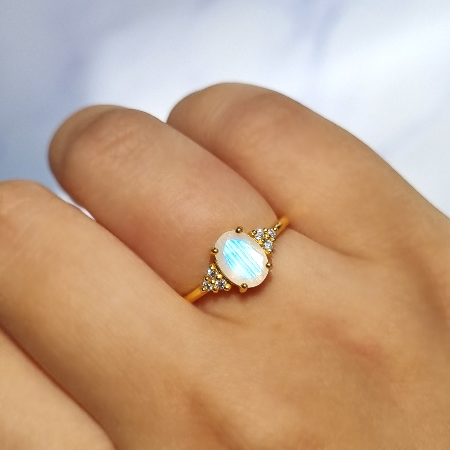 oval cut rainbow moonstone  engagement, promise and wedding ring  in 18k gold vermeil.