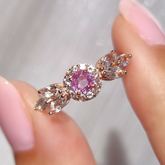 round cut pink sapphire halo ring with marquise wing white topaz in 18k rose gold vermeil
