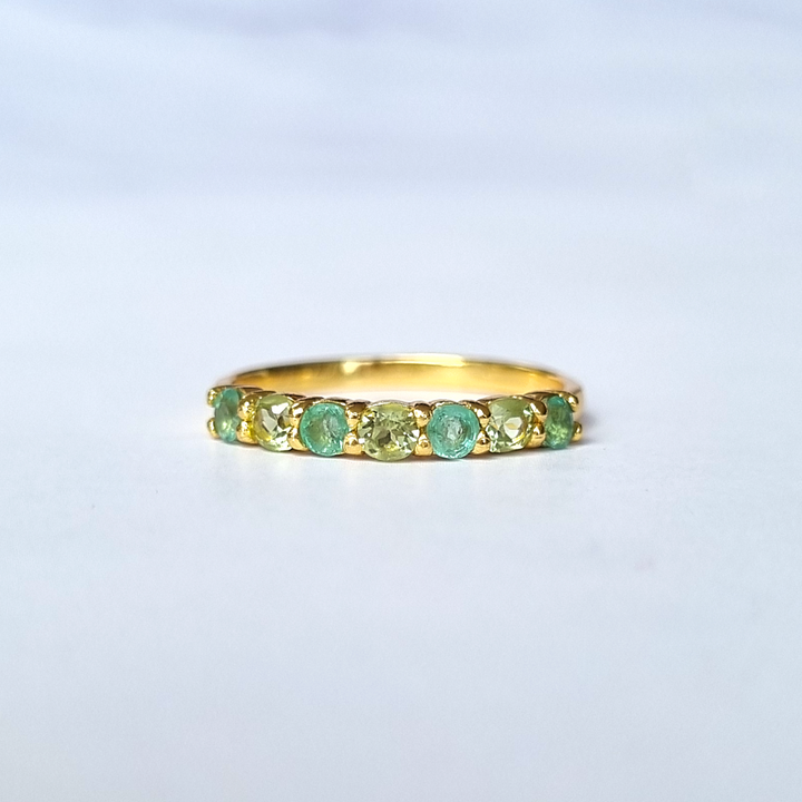 round cut emerald and oval cut peridot eternity stackable wedding ring in 18k gold vermeil 