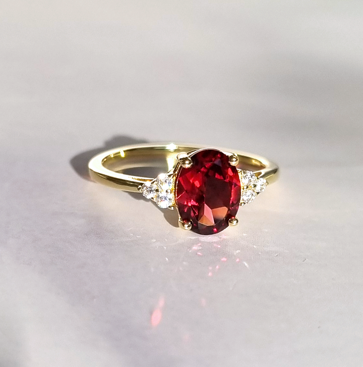 Oval cut garnet gemstone engagement and promise ring in 18k gold vermeil 