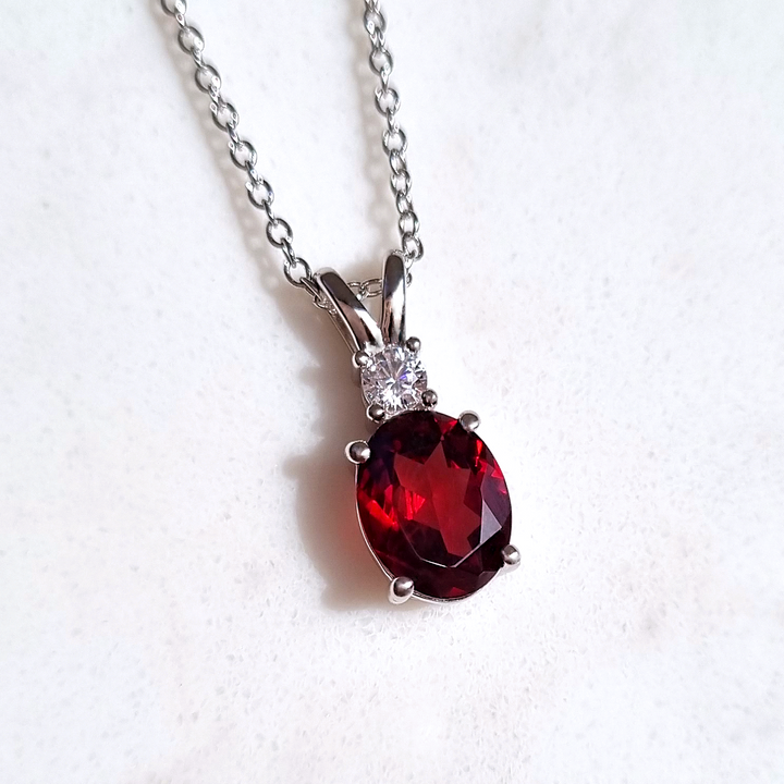 Oval cut garnet and round cut diamond necklace in sterling silver, ideals for promise ,birthday, anniversary, mother's day and wedding gift.