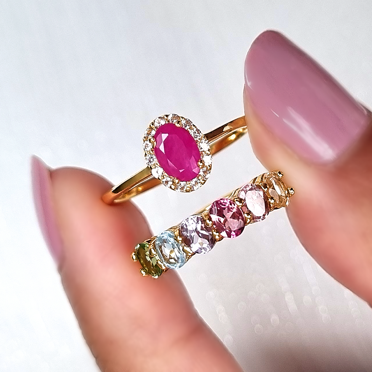  oval cut pinkish red gemstone and white topaz and oval cut rainbow colour gemstone ring in 18k gold vermeil.