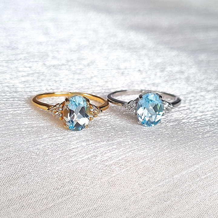 oval cut sky blue topaz engagement and wedding ring in sterling silver and 18k gold vermeil