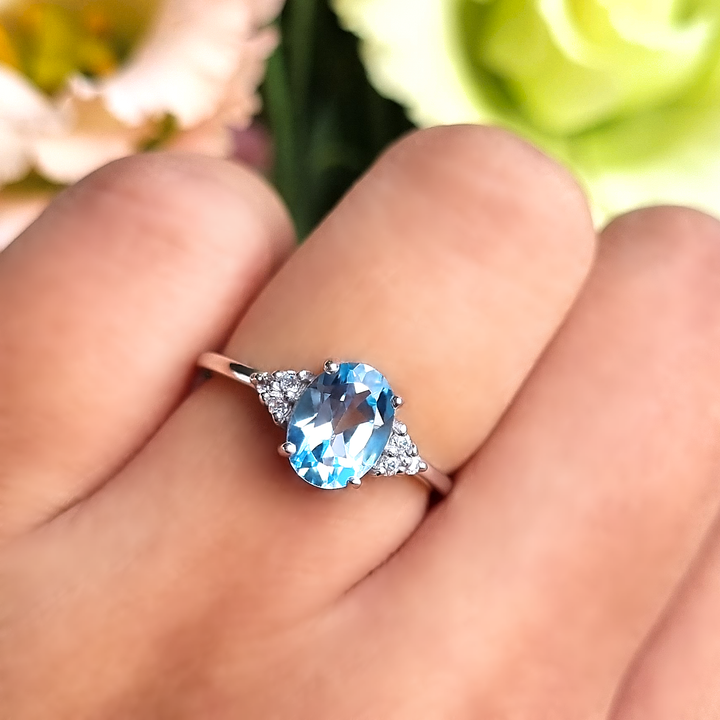 oval cut sky blue topaz engagement and wedding ring in sterling silver