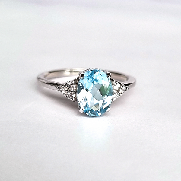oval cut sky blue topaz engagement and wedding ring in sterling silver