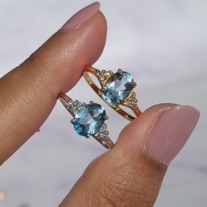oval cut sky blue topaz engagement and wedding ring in sterling silver and 18k gold vermeil